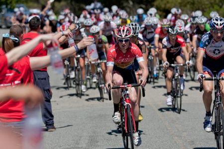 Temperatures in the eighties for the mid-day race kept feed-zone staff busy on bottle duty.
