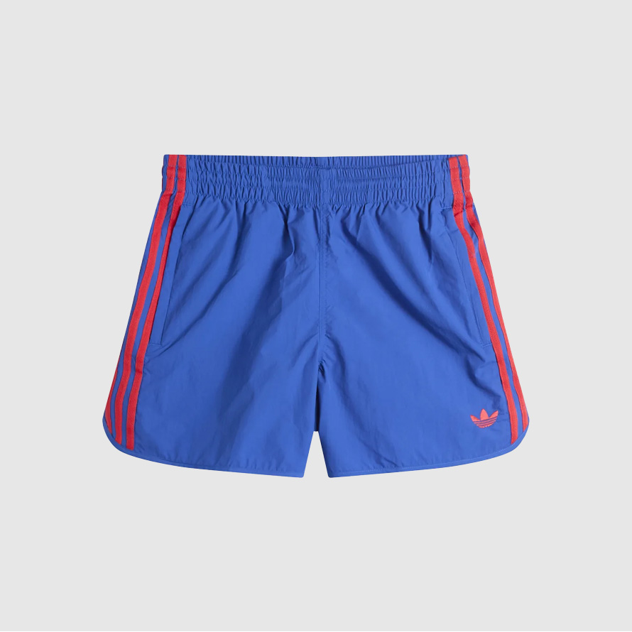 Blue track shorts with red stripes.