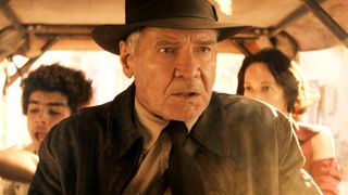 (L-R): Teddy (Ethann Isidore), Indiana Jones (Harrison Ford) and Helena (Phoebe Waller-Bridge) in Lucasfilm's INDIANA JONES AND THE DIAL OF DESTINY