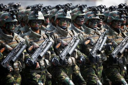 North Korean special forces soldiers march in a military parade.