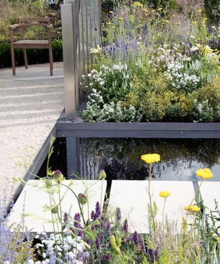 water feature and stepping stones in modern garden