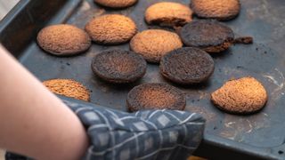 Burnt cookies on baking tray