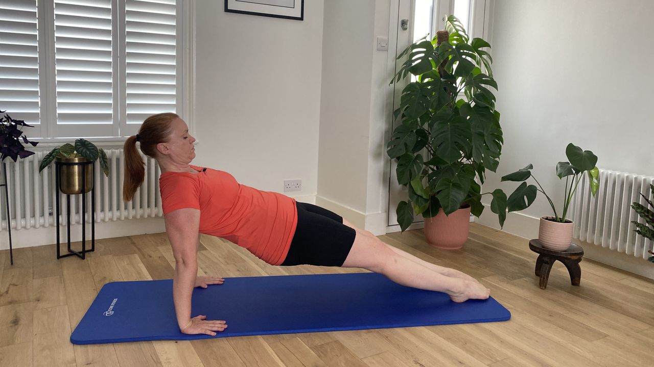 Ruth Smith performing low-impact leg pull move to build muscle