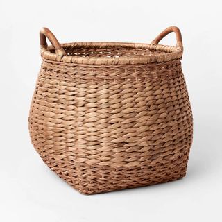 Large Woven Basket with Handles on white background