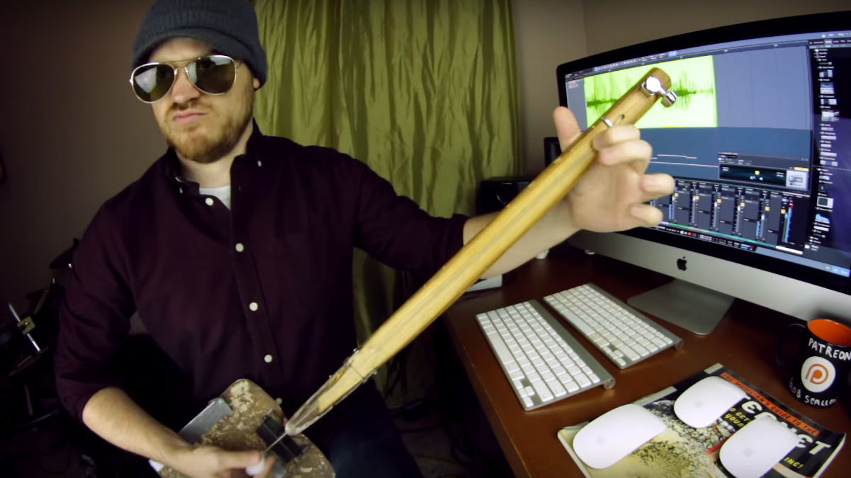 Rob Scallon playing a shovel