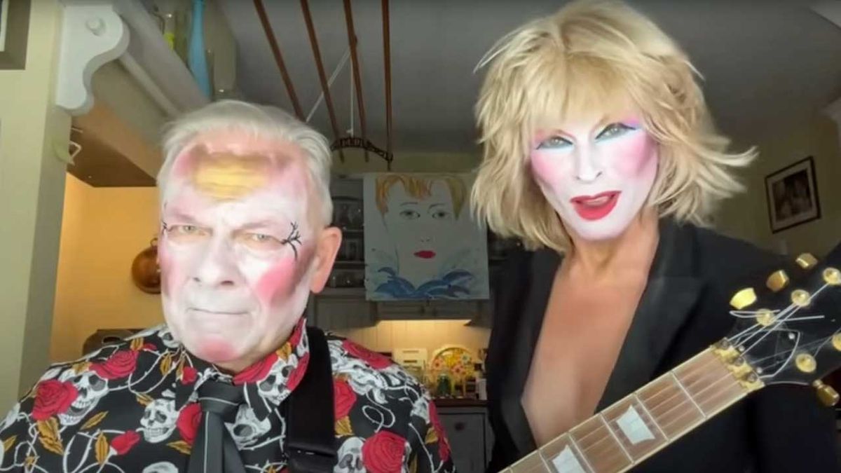 Robert Fripp and Toyah Willcox in their kitchen wearing David Bowie-style makeup