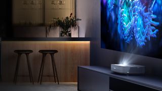 Hisense's PL1TUK laser projector in a living room setting