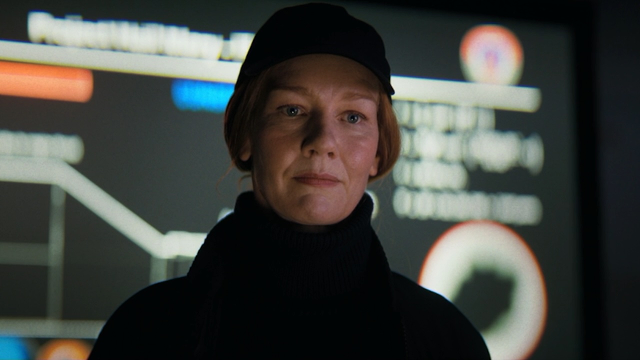 Stratt in front of a screen in Project Hail Mary