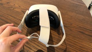 Oculus Quest 2 Headset with strap being adjusted