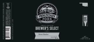 a black label for a beer named moon shadow by mountain fork brewery
