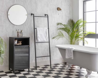 Bathroom cabinet ideas: Bathroom with wooden ladder, black bathroom cabinet and grey bathtub