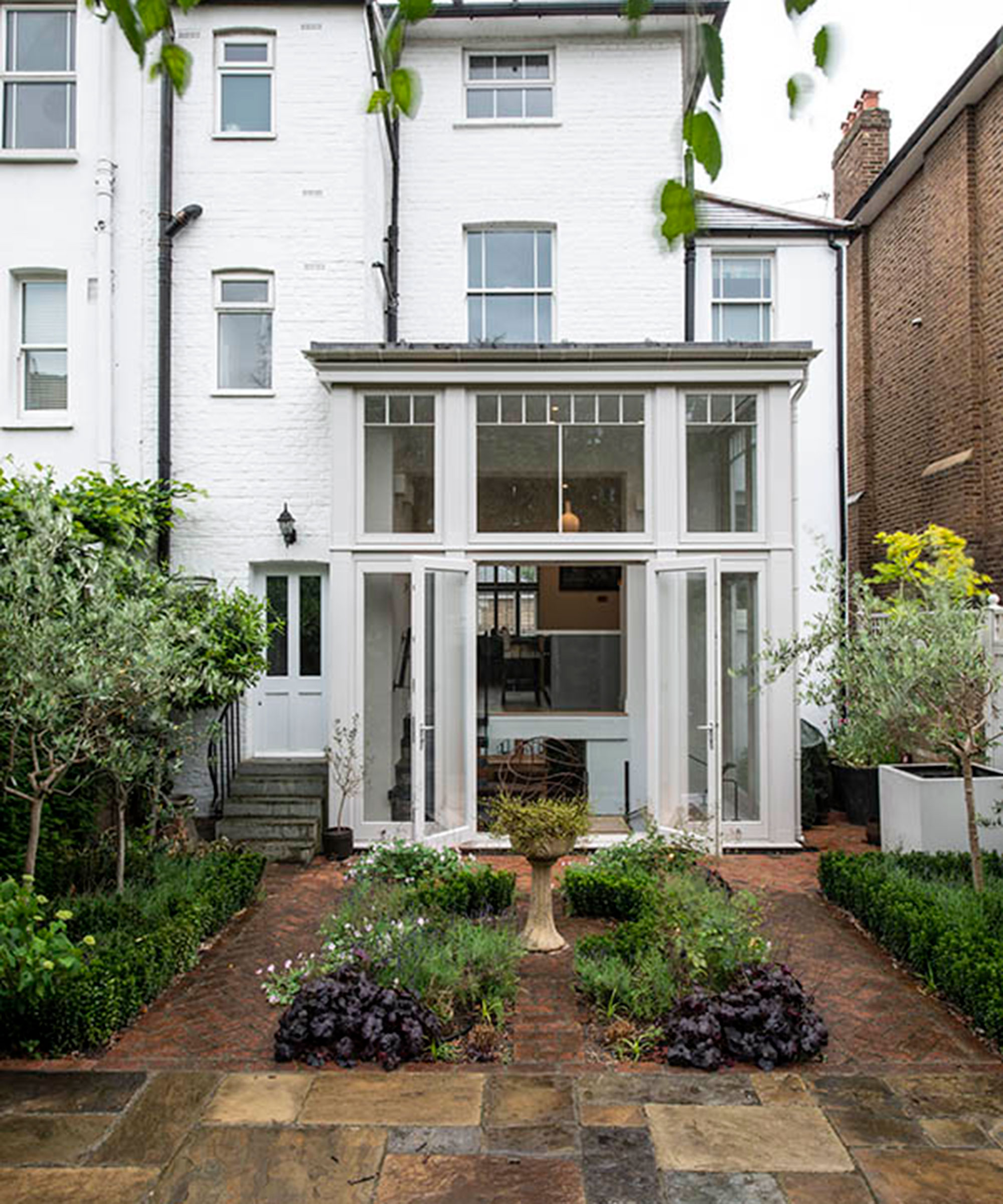 two-storey conservatory with courtyard garden