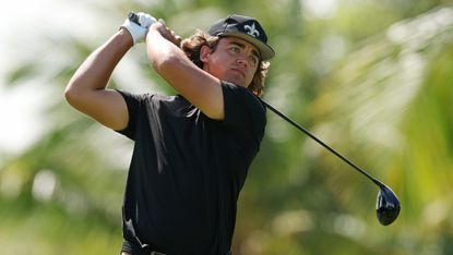 Garrick Higgo takes a shot at the Corales Puntacana Championship