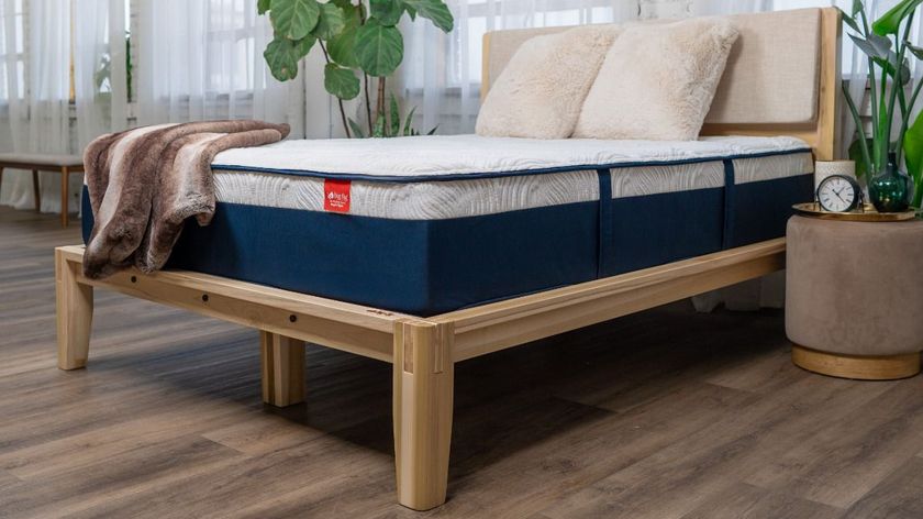 The Big Fig Luxe Mattress in a bed frame in a bedroom