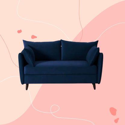 Swyft Model 08 sofa bed in Indigo Velvet on graphic pink background