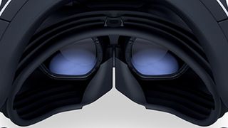 A close up of PlayStation VR 2's displays, black glass goggles on a white background