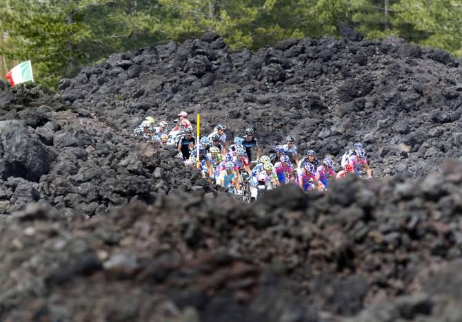 The gruppo passes through the lava on the slopes of Mount Etna