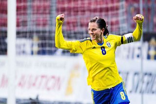 Lotta Schelin celebrates after her 200 goal in the swedish national team during the Women's international friendly between Sweden and Germany at Behrn Arena on October 29, 2014 in Orebro, Sweden. (Photo by Andreas Froeberg/Bongarts/Getty Images)