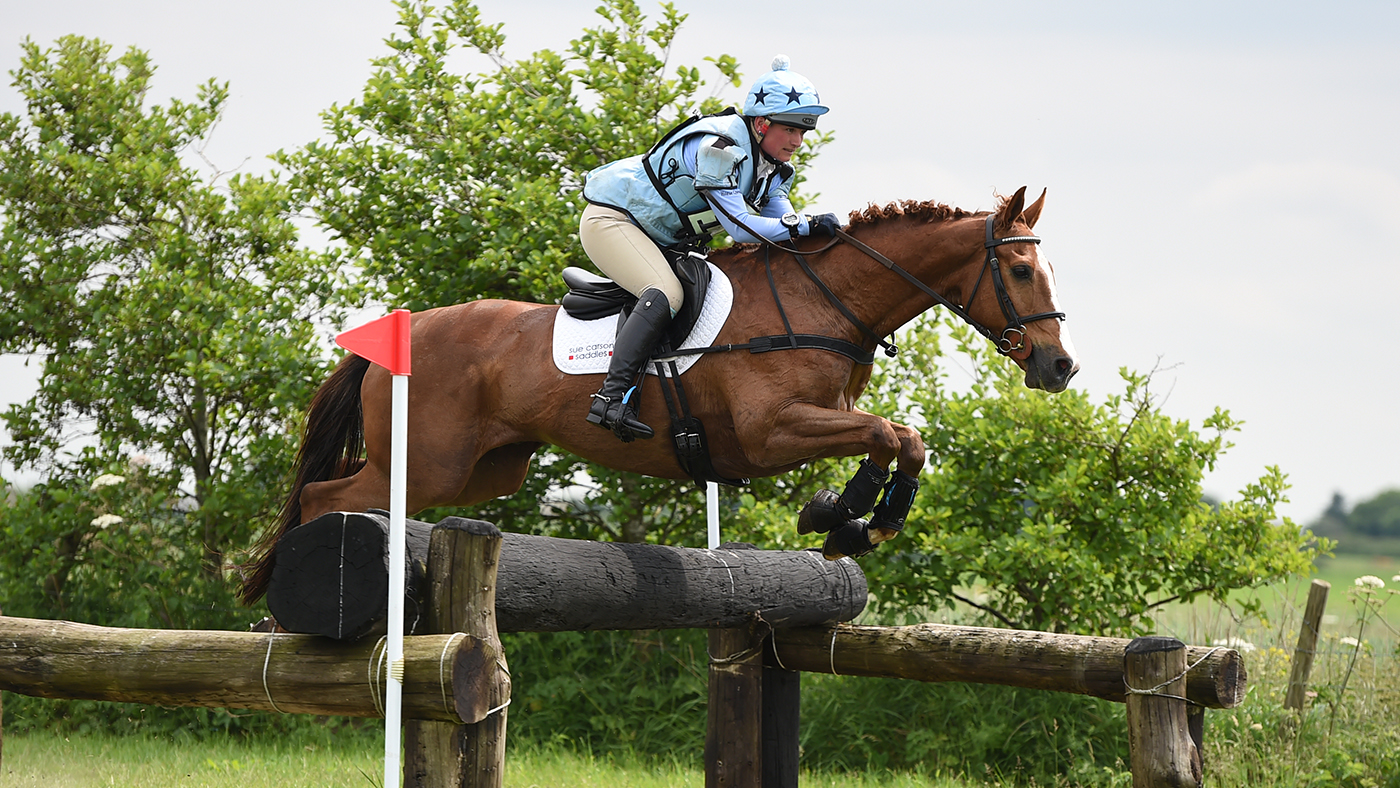 Alice Pearson riding Jack The Ginger in a breastgirth style of eventing breastplate