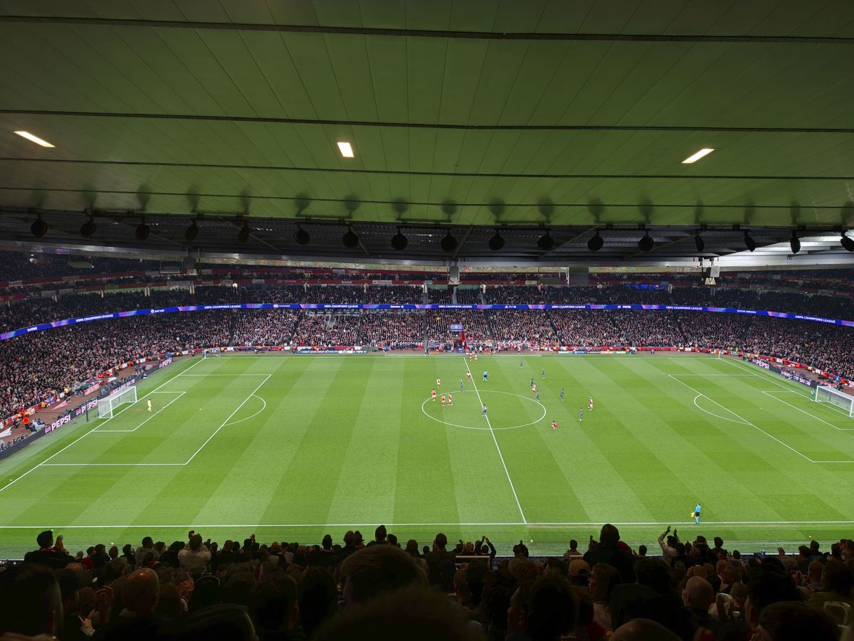 Action photos during a Champions League soccer match at Arsenal's Emirates stadium, taken with the Oppo Find X9 Ultra and teleconverter lens