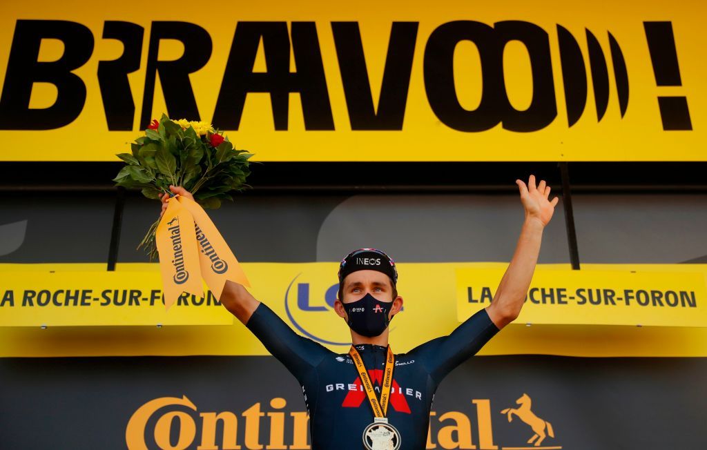 Stage winner Team Ineos rider Polands Michal Kwiatkowski celebrates on the podium after winning the 18th stage of the 107th edition of the Tour de France cycling race 168 km between Meribel and La Roche sur Foron on September 17 2020 Photo by STEPHANE MAHE POOL AFP Photo by STEPHANE MAHEPOOLAFP via Getty Images