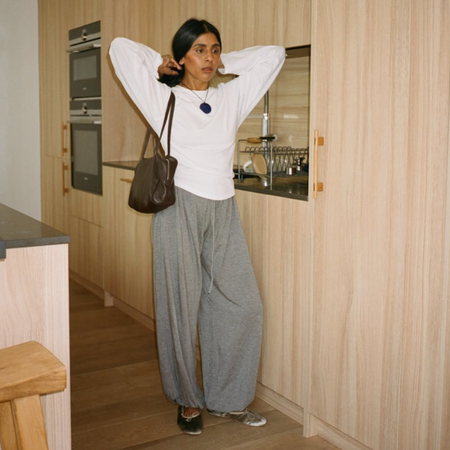 Influencer Monikh wearing sarouel pants and ballet flats. 