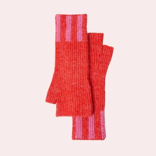 flat lay image of red and pink gloves