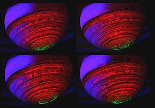 Four false-color images showing the southern aurora on Saturn. Scientists may have detected four brand-new planets, thanks to the glow of their auroras.