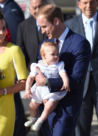 Prince William with Prince George as a baby in Australia