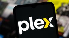 Plex streaming service logo pictured on a smartphone screen.
