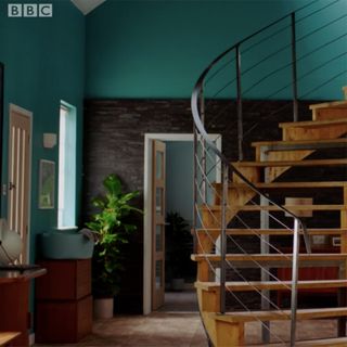 room with curled stairway