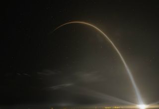 Falcon 9 Arcs Through the Sky