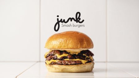 A photo of a Junk smash burger. 