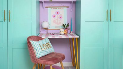 Teal wardrobes in a pink room