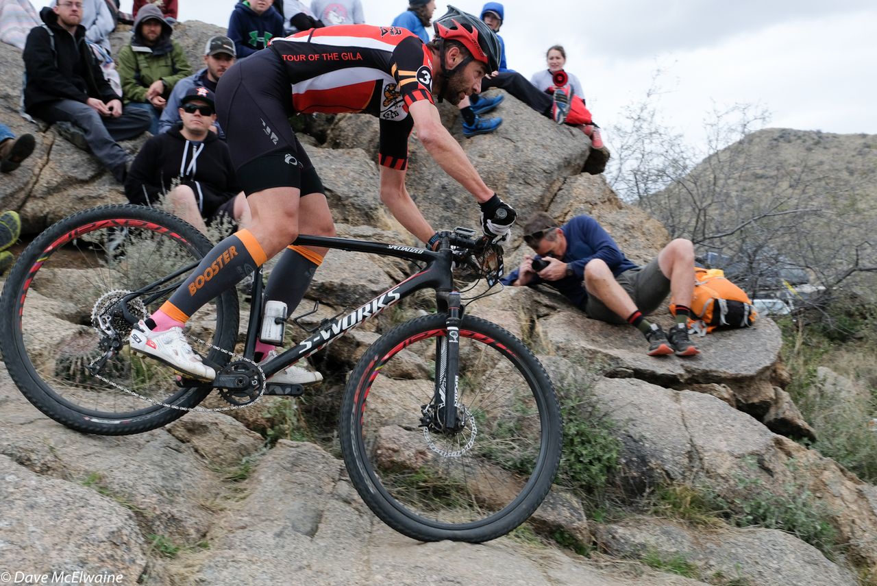 A racer descends the tricky rock drops