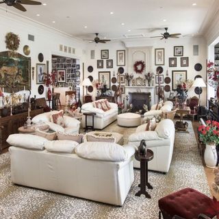 tom jones homes living room with sofa cushions and rug