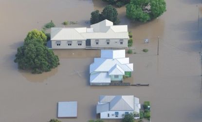 Flood waters have forced more than 3,500 people to evacuate their homes in north-central Australia.