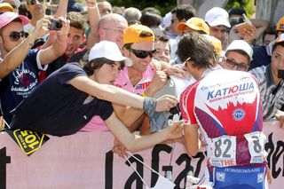 Danilo Di Luca signs an autograph