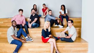 Coding courses: people sitting around with laptops