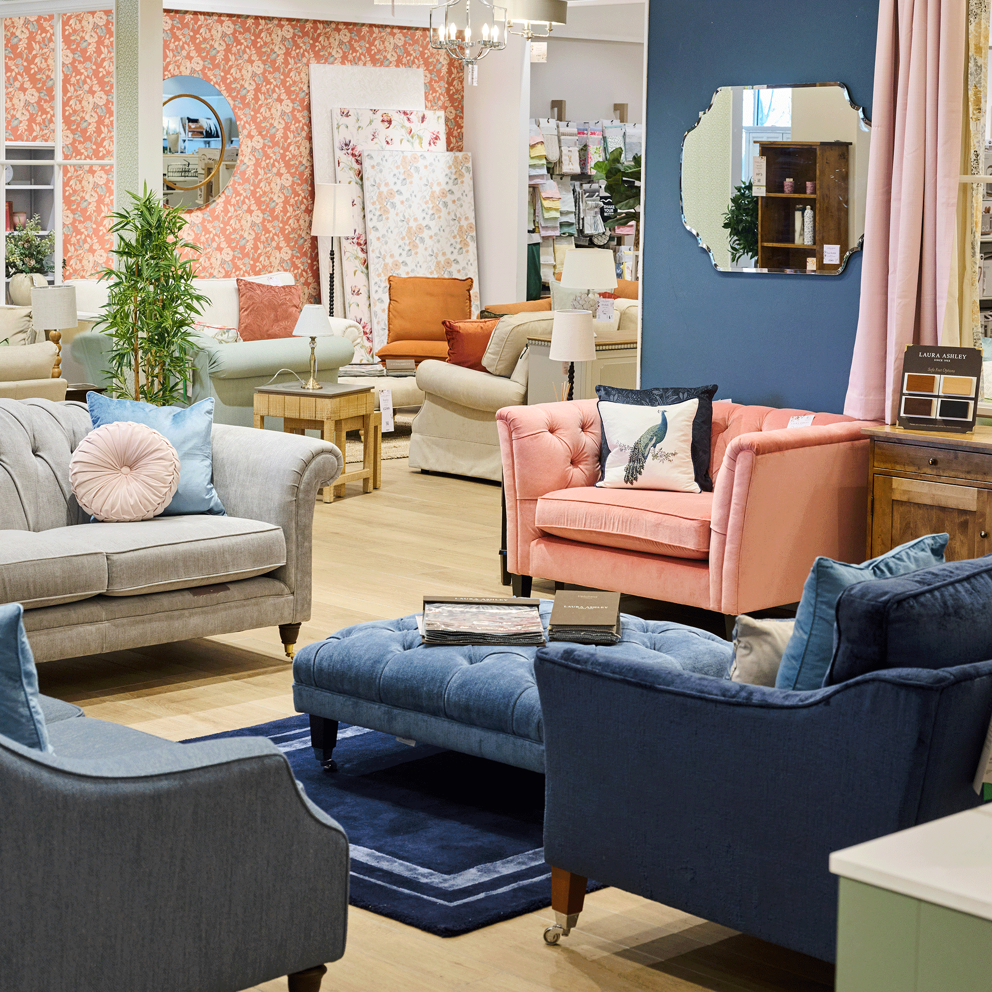 Laura Ashley store-within-store at Westfied Shepherds bush, showcasing different coloured sofas