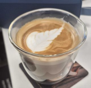 a photograph of a latte made by the DeLonghi La Specialista Opera espresso machine