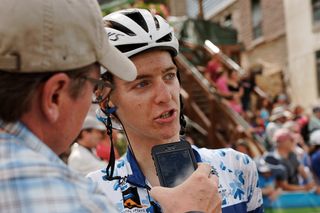 Adrien Costa talks with reporters after finishing second at the 2016 Tour of Utah
