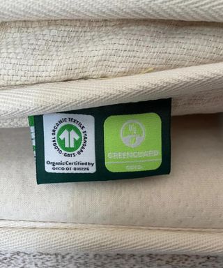 GOTS and Greenguard labels on the Birch Plush Organic Mattress Topper.