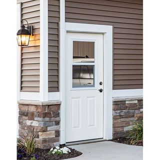 White fiberglass exterior door