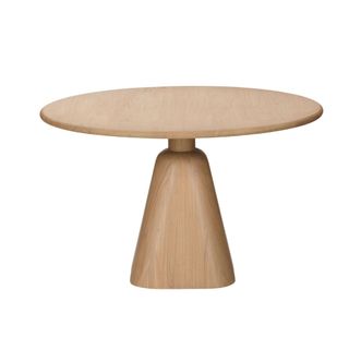 A round, wooden dining room table