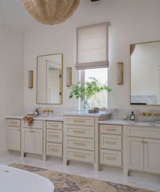 Griege bathroom with built in cabinets
