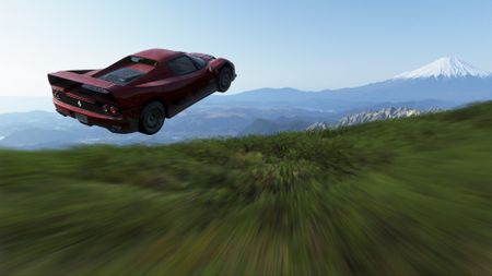 A red car soars above a lush green forest towards Mt Fuji in Forza Horizon 6, the speed blurring the view