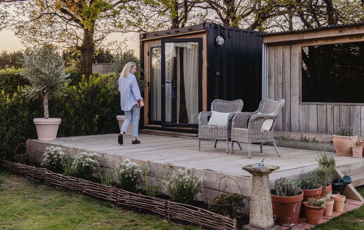A shipping container transformed into an outdoor living space.