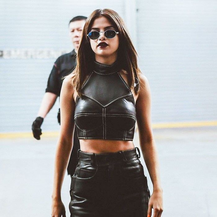 Selena Gomez's Plunging Top & Leather Mini Skirt – Photos