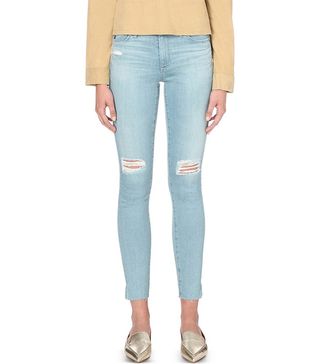 AG + Distressed Super-Skinny Low-Rise Jeans